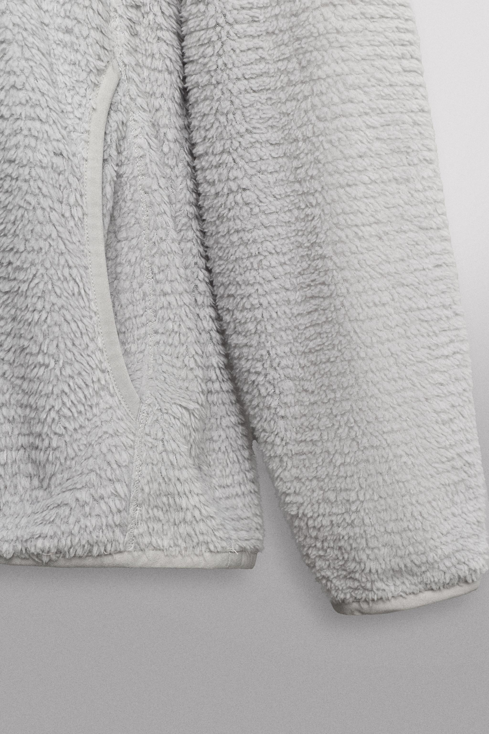 SWEAT POLAIRE TEXTURÉ À CAPUCHE